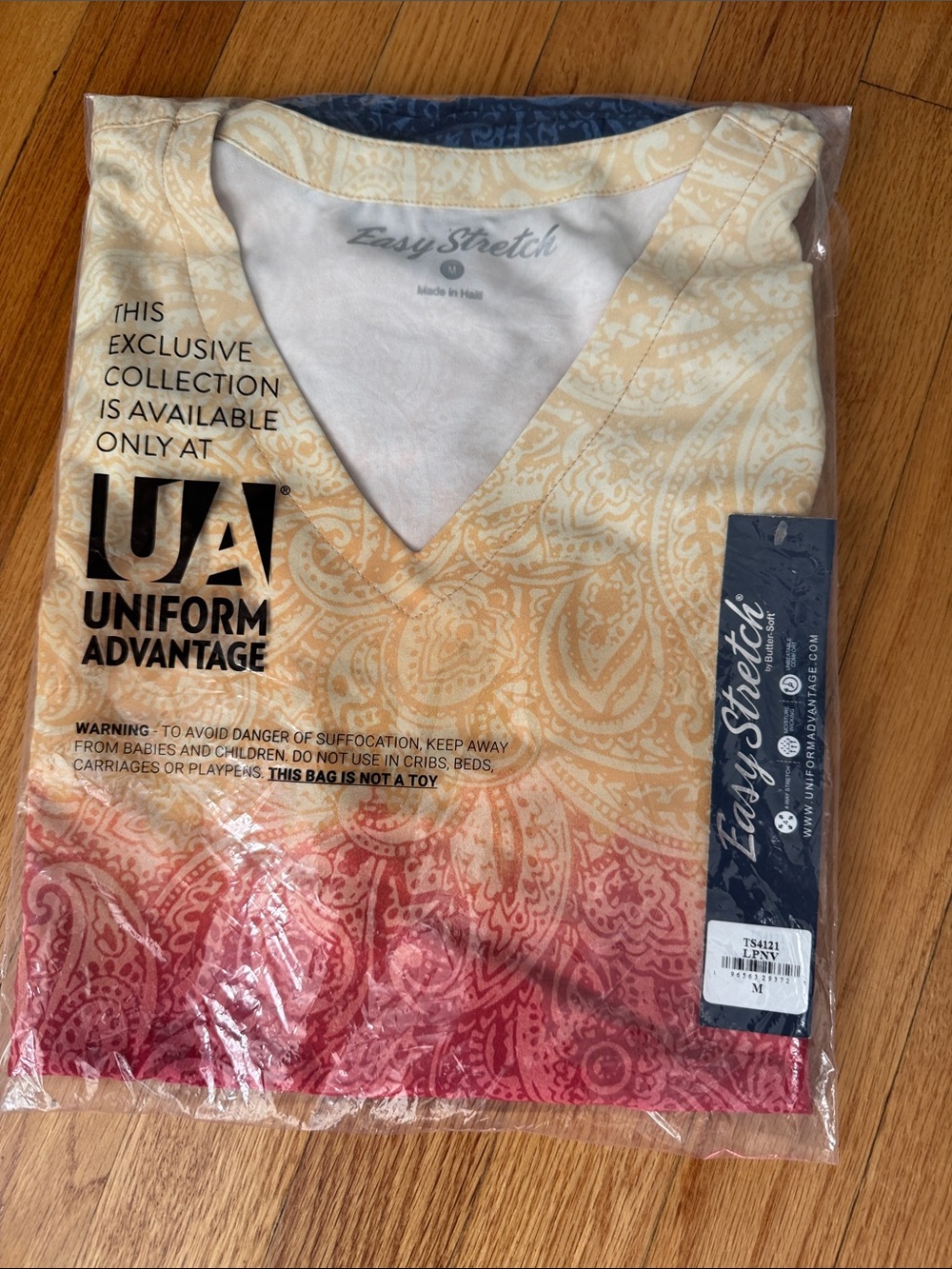 Uniform Advantage Women’s Ombré V-Neck Top in Cream and Red